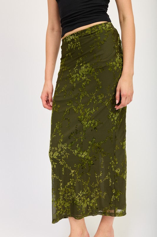 Fitted maxi skirt with slit by Jade Icarus, showcasing smooth fabric and stylish design in a fashion-forward look.
