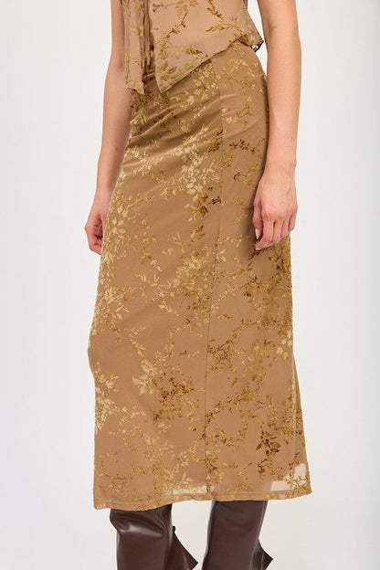 Automotive fitted maxi skirt with slit by Jade Icarus, featuring sleek fabric and stylish design, shown in the image.