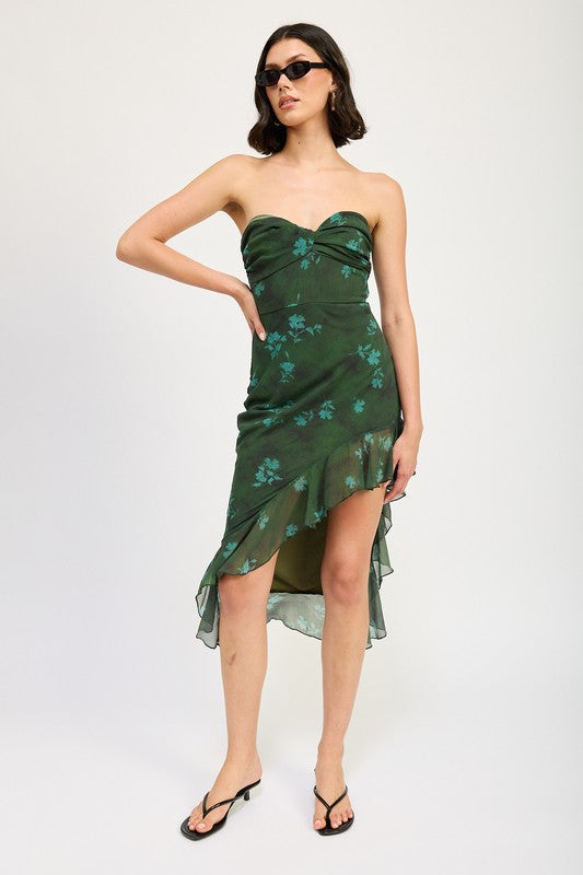 Automotive part with asymmetrical ruffle design, branded Jade Icarus, styled as a maxi dress with ruffle details in a sleek, modern look.