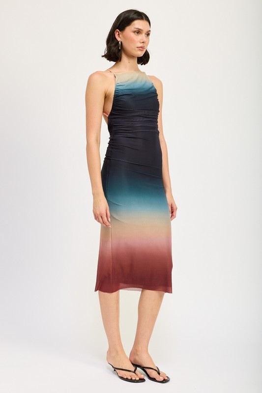 Halter neck ombre maxi dress by Jade Icarus featuring flowing fabric and vibrant color gradient.