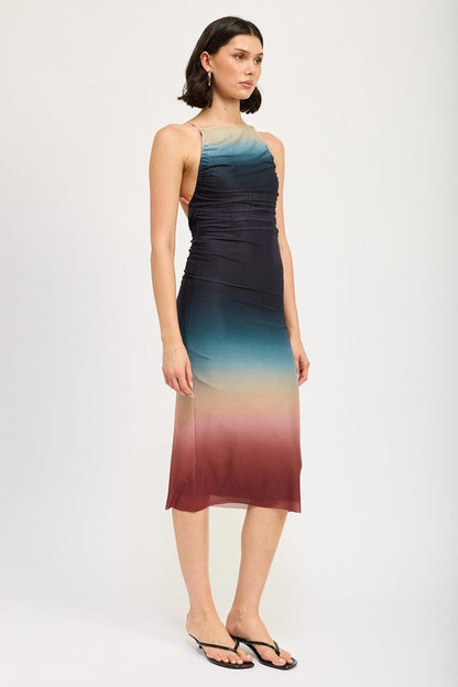 Halter neck ombre maxi dress by Jade Icarus featuring flowing fabric and vibrant color gradient.