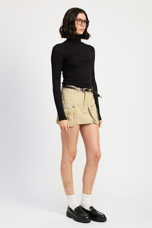 Jade Icarus exposed cargo pocket mini skirt in automotive style, featuring visible cargo pockets and a fitted design.