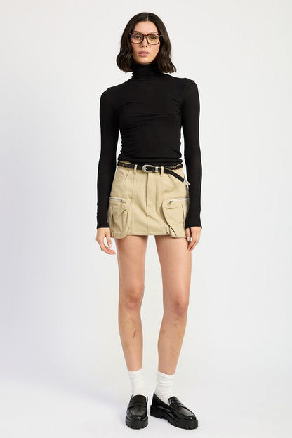 Jade Icarus exposed cargo pocket mini skirt with automotive-inspired design, featuring rugged fabric and multiple cargo pockets.