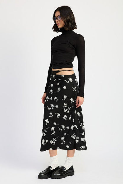 Jade Icarus mix media asymmetrical satin maxi skirt with layered design and flowing fabric, styled with a modern, artistic look.