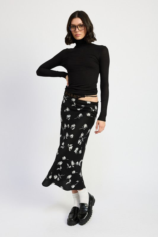 Asymmetrical satin maxi skirt by Jade Icarus featuring mixed media design and a flowing silhouette.