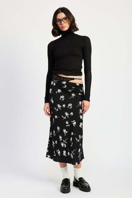 Jade Icarus mix media asymmetrical maxi satin skirt with layered design and flowing fabric, shown on a model.