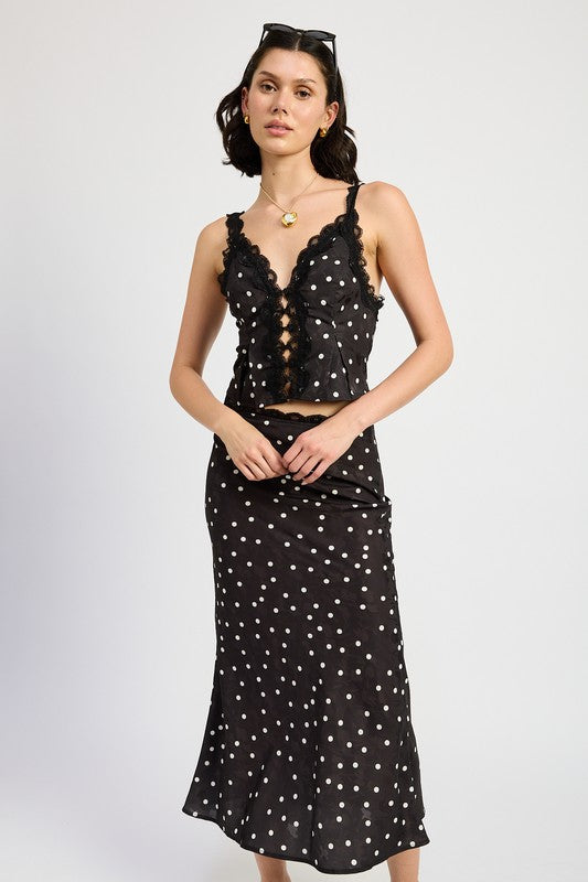 Automotive satin midi skirt with lace trim by Jade Icarus, featuring smooth fabric and delicate lace detailing.