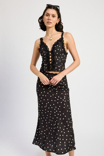 Automotive satin midi skirt with lace trim by Jade Icarus, featuring smooth fabric and delicate lace detailing.