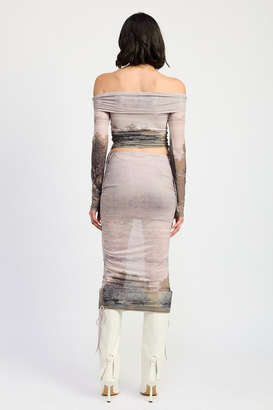 Automotive-themed Jade Icarus ruched midi skirt with drawstrings, featuring a stylish, textured fabric and a sleek, modern design.