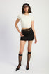 Automotive Jade Icarus Peakaboo lace trim min skirt with detailed lace design and fitted style, shown in close-up image.