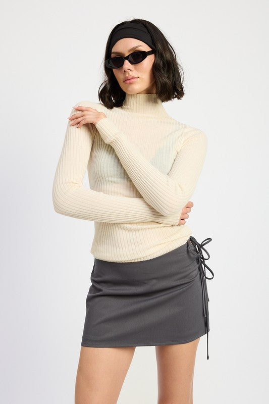 Automotive Mini low-waisted skirt with ribbon ties by Jade Icarus, featuring sleek design and fabric details in the image.