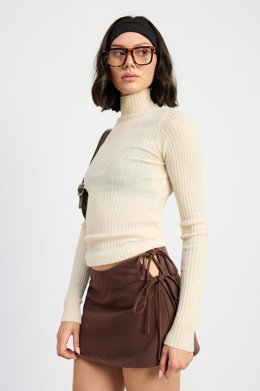 Automotive part from Jade Icarus featuring a mini low-waisted skirt with ribbon ties, displayed in a detailed product image.