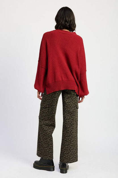 Jade Icarus mid-rise wide-leg cargo pants with multiple pockets, relaxed fit, and durable fabric, shown on a model.