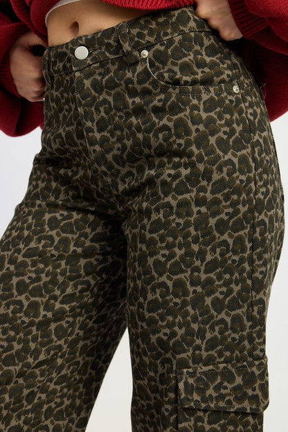 Jade Icarus mid-rise wide-leg cargo pants with large front pockets, relaxed fit, and durable fabric, shown on a model.