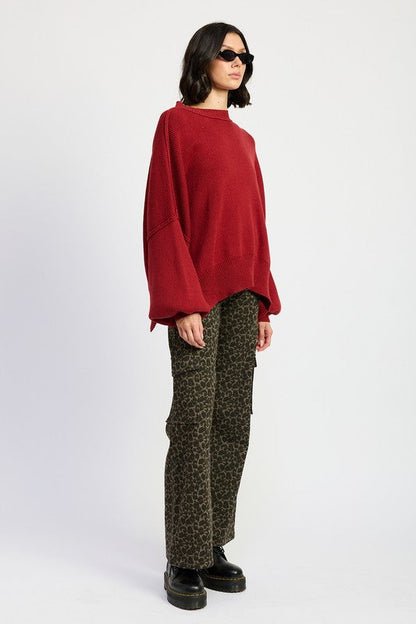 Jade Icarus mid-rise wide-leg cargo pants with large side pockets and relaxed fit, shown in a neutral fabric.