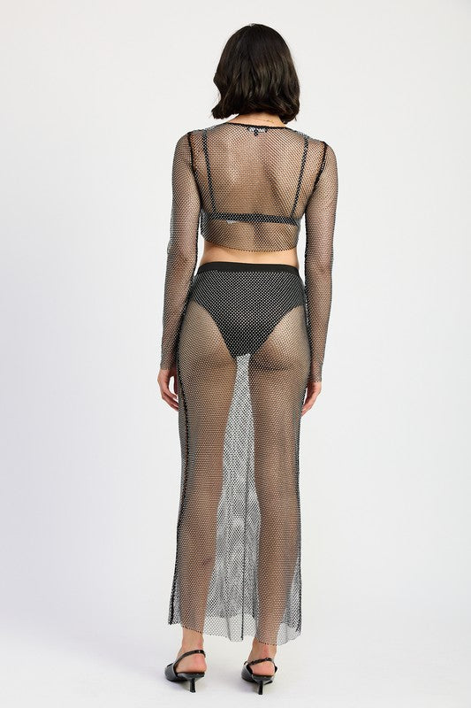 Shimmering sheer rhinestone maxi skirt by Jade Icarus, showcasing its elegant, flowing design with sparkling rhinestone details.