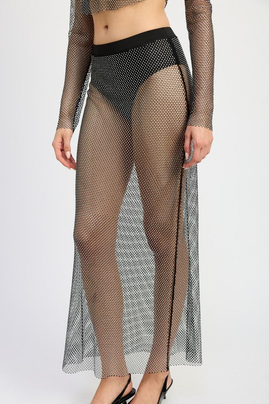 Sheer rhinestone maxi skirt by Jade Icarus, featuring sparkling embellishments and flowing fabric, designed for elegant style.