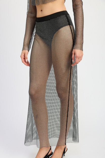 Sheer rhinestone maxi skirt by Jade Icarus, featuring sparkling embellishments and flowing fabric, designed for elegant style.