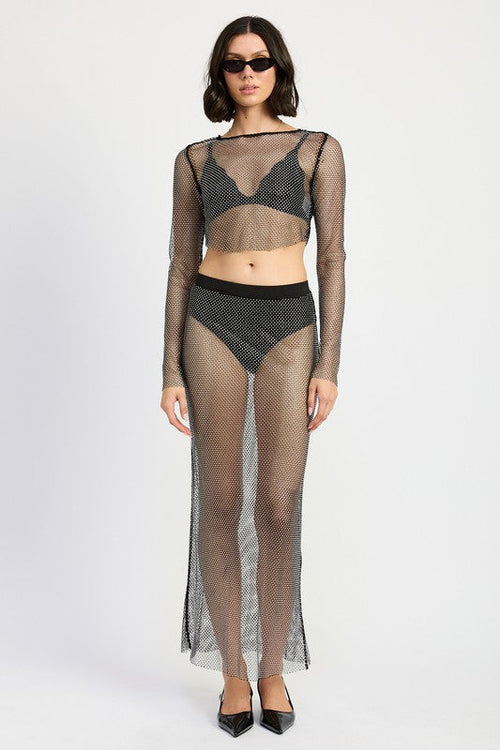 Sheer rhinestone maxi skirt by Jade Icarus featuring sparkling embellishments and flowing fabric.