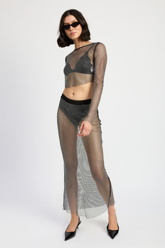 Shimmering sheer rhinestone maxi skirt by Jade Icarus, featuring intricate rhinestone detailing and flowing fabric.