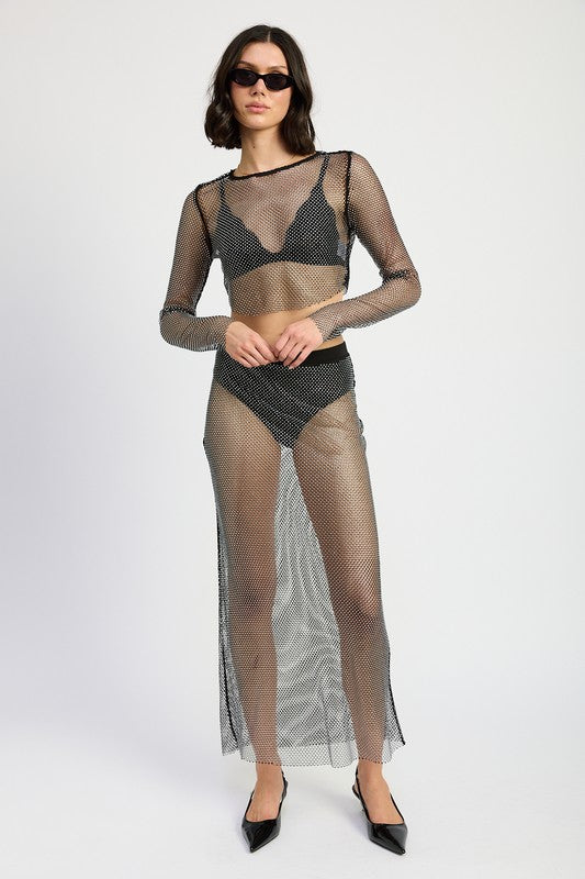 Sheer rhinestone maxi skirt by Jade Icarus with intricate rhinestone details and flowing fabric, designed for a stylish appearance.