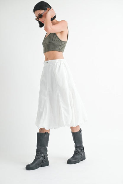 Jade Icarus parachute bubble midi skirt in vibrant colors, showcasing its unique puffed design and lightweight fabric.