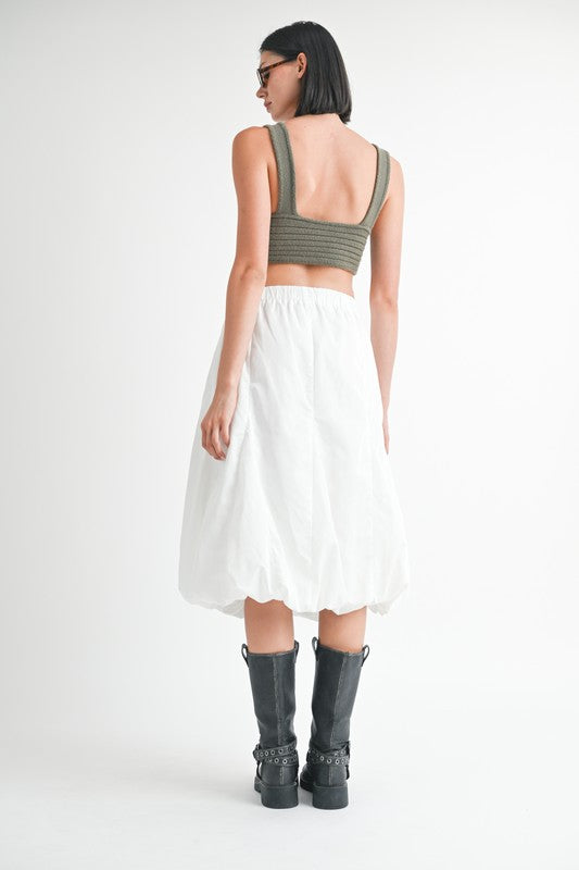 Jade Icarus parachute bubble midi skirt in vibrant colors, shown with flowing fabric and stylish design.