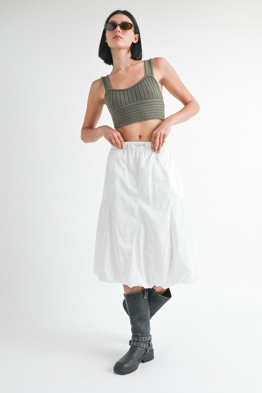 Jade Icarus parachute bubble midi skirt in vibrant fabric, showcasing its unique bubble design and midi length.