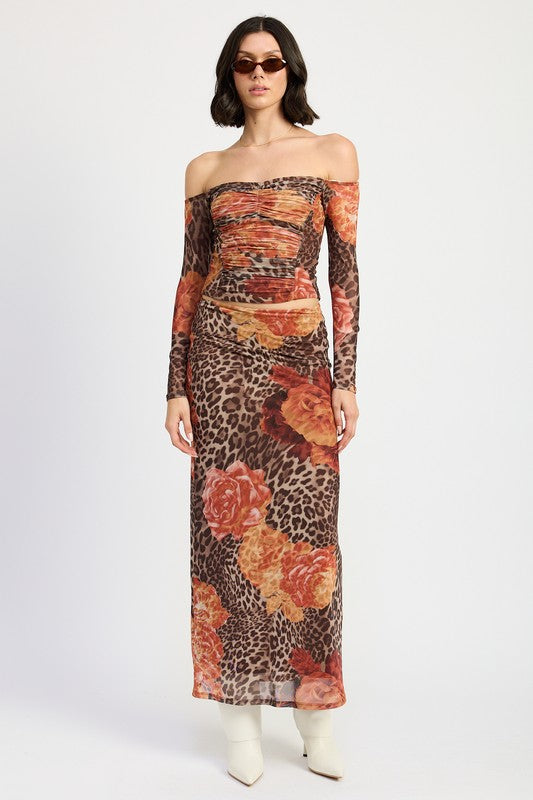 Automotive printed mesh maxi skirt by Jade Icarus with bold patterns, flowing fabric, and intricate detailing.