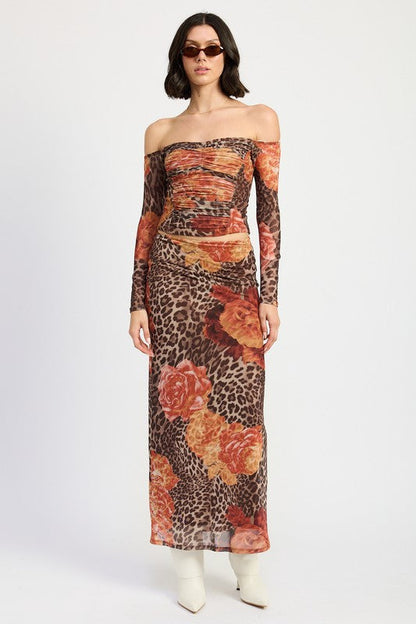 Automotive printed mesh maxi skirt by Jade Icarus with bold patterns, flowing fabric, and intricate detailing.