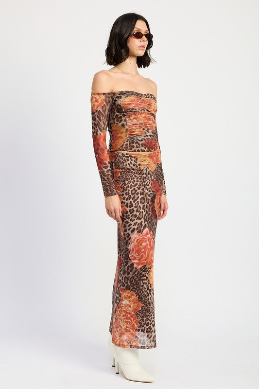 Automotive printed mesh maxi skirt by Jade Icarus featuring a flowing design with bold patterns and lightweight fabric.