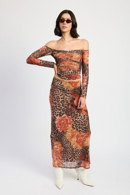 Automotive printed mesh maxi skirt by Jade Icarus with intricate design and flowing fabric, showcased in a stylish fashion photo.