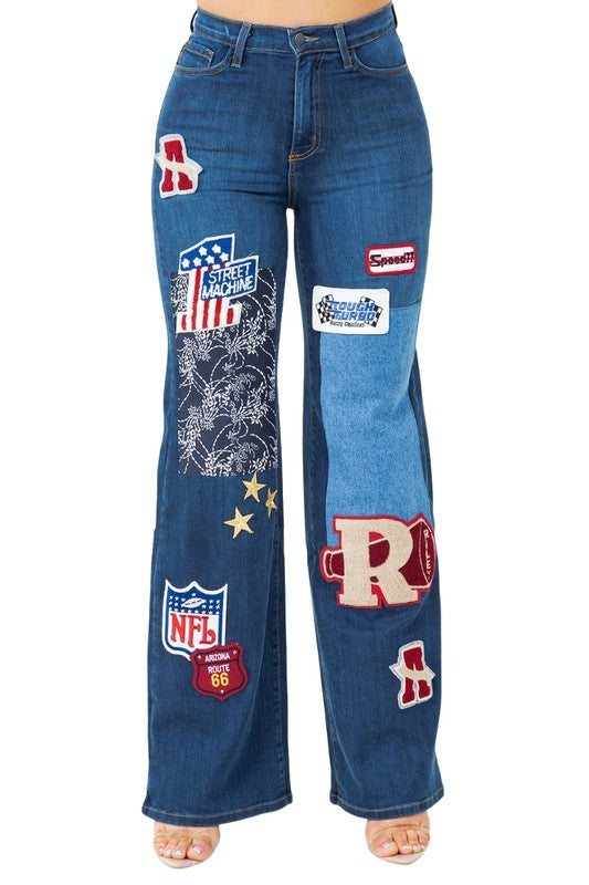 Women’s Brooklyn Varsity Dark Wash Jeans by Jade Icarus, showcasing fitted denim with classic varsity styling and dark wash finish.