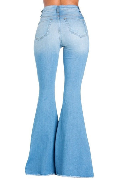 Light wash Jade Icarus Logan Bell Bottom Jean in automotive style, featuring a flared silhouette and classic denim details.
