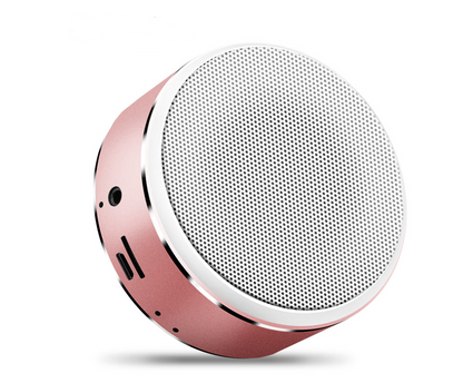 Maroon Asteria portable Bluetooth mini speaker with built-in battery, compact design for on-the-go audio enjoyment