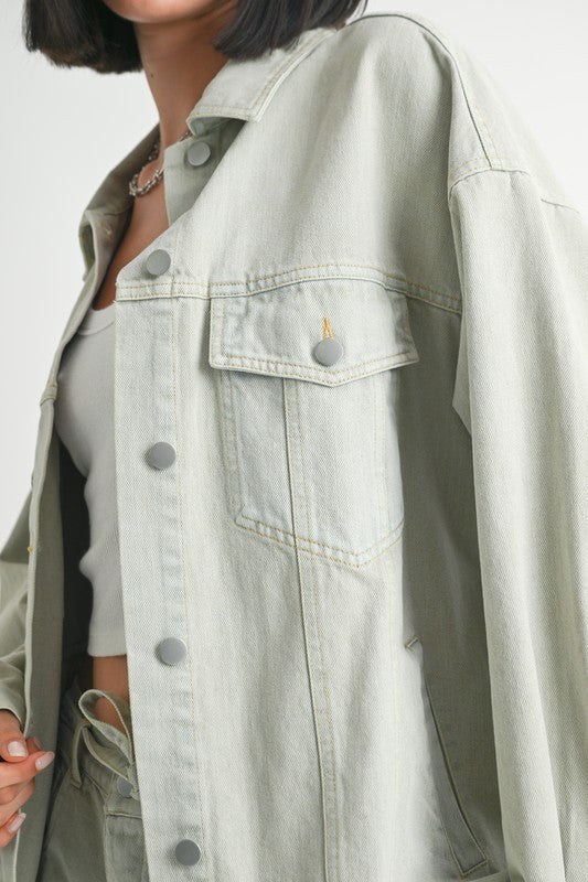 Women’s oversized denim jacket by Jade Icarus featuring a relaxed fit and classic blue denim fabric.