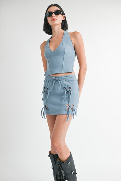 Close-up of a Jade Icarus French Terry Cutout Mini Skirt with unique cutout details and soft fabric texture.