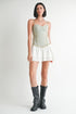 Mini sleeveless denim dress by Jade Icarus, featuring a casual fit with shoulder straps and classic denim fabric.
