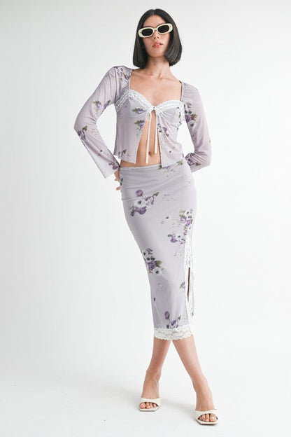 Automotive-themed floral midi skirt with lace trim by Jade Icarus, featuring a colorful floral pattern and delicate lace details.