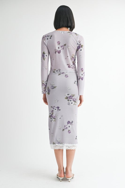 Automotive floral midi skirt with lace trim by Jade Icarus, featuring a floral print and elegant lace detailing.