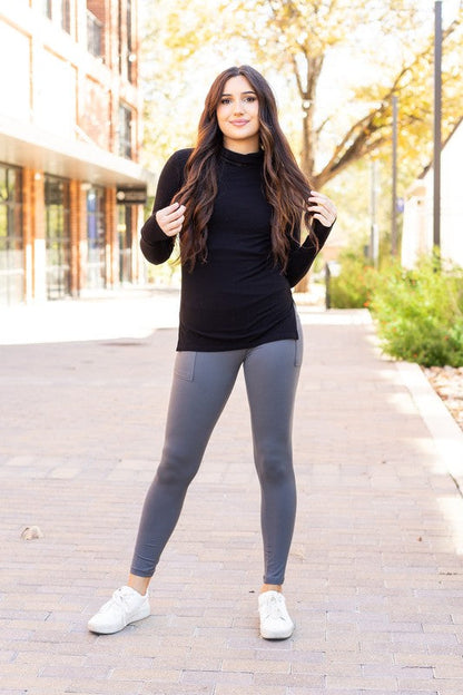 Charcoal crossover leggings for women by Jade Icarus, featuring a stylish, comfortable fit and unique design.