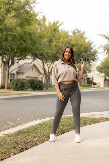 Charcoal crossover leggings for women by Jade Icarus, featuring a stylish design and comfortable fit.