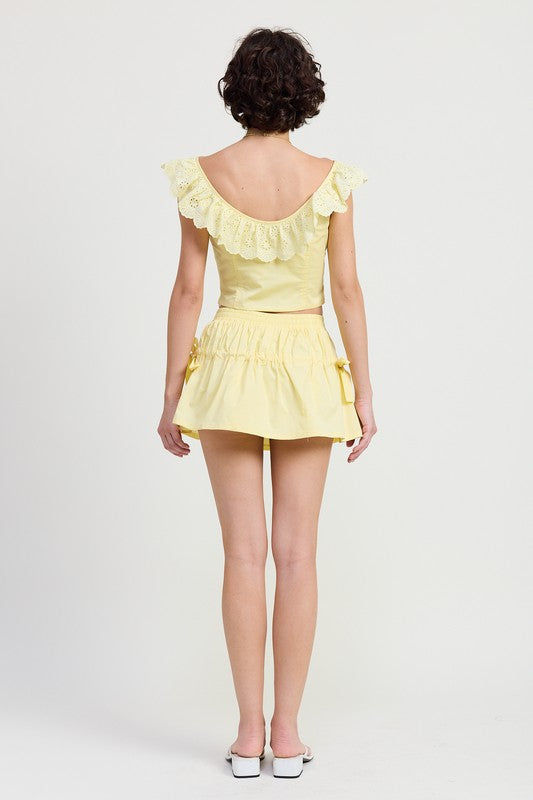 Automotive part image showing a Jade Icarus MNII Ruched Poplin Mini Skirt with detailed fabric texture and ruched design.