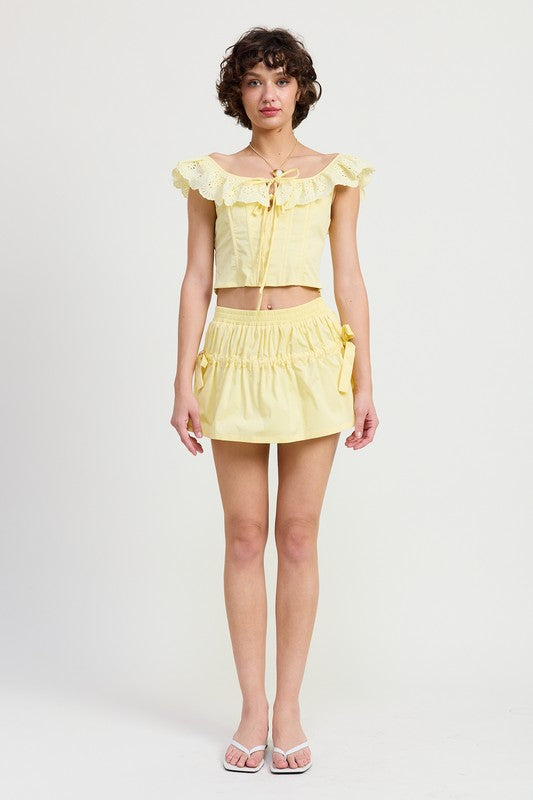 Jade Icarus MNII ruched poplin mini skirt, styled with automotive-inspired details and a fitted, ruched design.