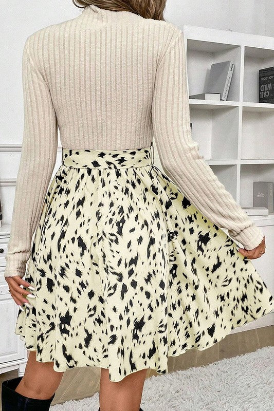 Women’s knit patchwork printed belted A-line dress by Jade Icarus, featuring a colorful pattern and waist belt, ideal for casual wear.