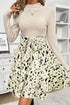 Women’s knit patchwork printed belted A-line dress by Jade Icarus, featuring a colorful pattern and a waist belt.