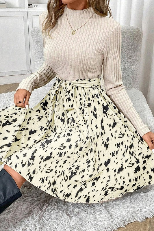 Women’s knit patchwork printed belted A-line dress by Jade Icarus featuring colorful patterns and a waist belt, perfect for casual wear.