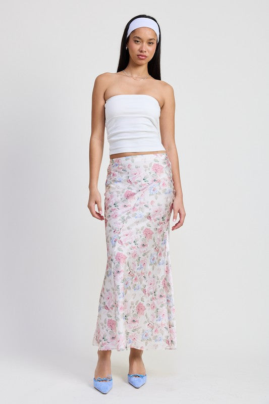 Automotive bias floral maxi skirt by Jade Icarus, featuring a long flowing design with vibrant floral patterns.