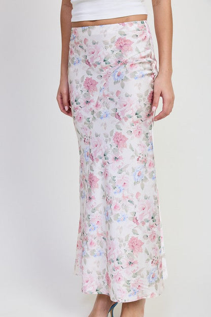 Jade Icarus floral maxi skirt with bias cut, flowing fabric, and vibrant floral pattern displayed in the image.