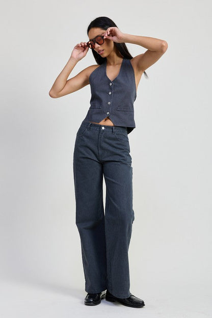 Fitted denim pants by Jade Icarus, folded neatly, showcasing their durable fabric and classic denim style.